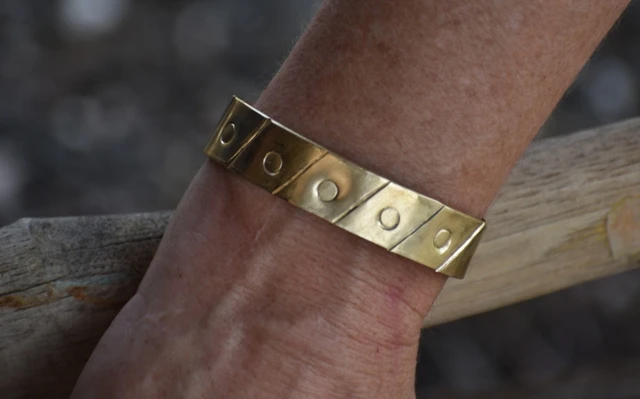 A brass bracelet 